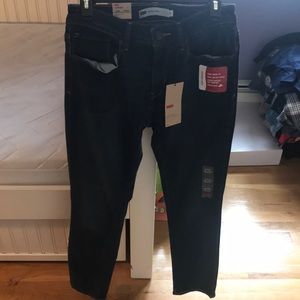 Levi’s skinny mid rise dark wash jeans